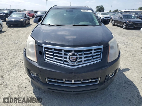 2013 Cadillac SRX Performance Collection z VIN 3GYFNHE37DS609463, wystawiony jako Copart lot #54606255 z przebiegiem 180 059 mil mil oraz Szkoda całkowita • Salvage title. Historia ofert i sprzedaży dostępna na DreamBid. Obrazek 5.