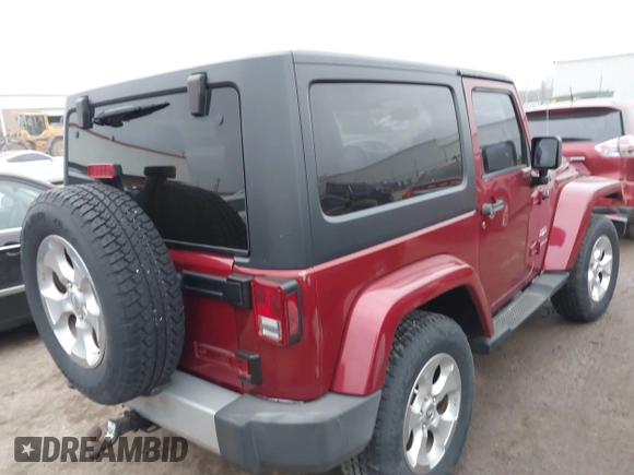 2013 Jeep Wrangler Sahara with VIN 1C4AJWBG7DL501146, listed as a IAAI auction lot 41714555 with 69,324 mi miles and . Bid and sale history available at DreamBid. Image 4.