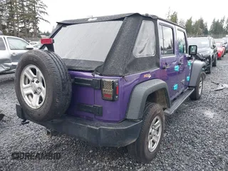 2018 Jeep Wrangler JK Unlimited Sport S with VIN 1C4BJWDG0JL847049, listed as a IAAI auction lot 41218525 with 90,588 mi miles. Bid and sale history available at carsss.com. Image 4.