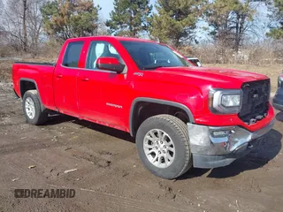 2017 GMC Sierra 1500 SLE z VIN 1GTV2MEC1HZ199237, wystawiony jako IAAI lot #41543728 z przebiegiem 121 431 mil mil oraz . Historia ofert i sprzedaży dostępna na DreamBid. Obrazek 1.