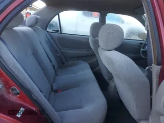 2002 Chevrolet Prizm z VIN 1Y1SK52842Z413505, wystawiony jako Copart lot #69058464 z przebiegiem 100 014 mil mil oraz Tytuł czysty. Historia ofert i sprzedaży dostępna na DreamBid. Obrazek 10.
