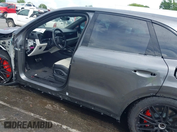 2025 Porsche Cayenne with VIN WP1AM2AY7SDA27408, listed as a IAAI auction lot 42462860 with 2,910 mi miles and . Bid and sale history available at DreamBid. Image 14.
