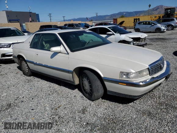 1994 Cadillac Eldorado ESC z VIN 1G6EL12Y6RU619510, wystawiony jako Copart lot #51524645 z przebiegiem 139 223 mil mil oraz Szkody całkowita. Historia ofert i sprzedaży dostępna na DreamBid. Obrazek 4.