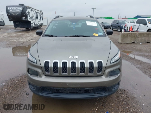 2017 Jeep Cherokee Altitude with VIN 1C4PJLABXHW613975, listed as a IAAI auction lot 42122784 with 101,626 mi miles and . Bid and sale history available at DreamBid. Image 12.