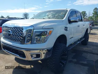2017 Nissan Titan SL z VIN 1N6AA1E51HN503222, wystawiony jako IAAI lot #41908062 z przebiegiem 121 334 mil mil oraz . Historia ofert i sprzedaży dostępna na DreamBid. Obrazek 17.
