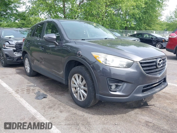 2016 Mazda CX-5 Touring z VIN JM3KE4CY4G0692655, wystawiony jako IAAI lot #42318657 z przebiegiem 212 826 mil mil oraz . Historia ofert i sprzedaży dostępna na DreamBid. Obrazek 1.