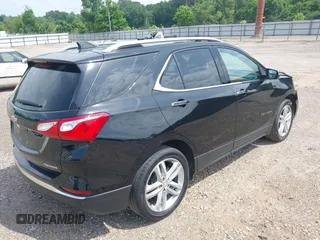 2021 Chevrolet Equinox Premier with VIN 2GNAXNEV5M6151910, listed as a IAAI auction lot 42110010 with 45,911 mi miles and . Bid and sale history available at DreamBid. Image 4.