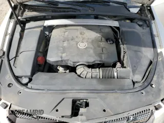 2010 Cadillac CTS Luxury z VIN 1G6DE5EG9A0104691, wystawiony jako Copart lot #50609575 z przebiegiem 151 849 mil mil oraz Szkoda całkowita • Salvage title. Historia ofert i sprzedaży dostępna na DreamBid. Obrazek 13.
