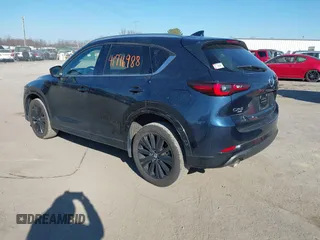 2022 Mazda CX-5 2.5 Turbo with VIN JM3KFBAY4N0534690, listed as a IAAI auction lot 41716988 with 23,910 mi miles and . Bid and sale history available at carsss.com. Image 3.