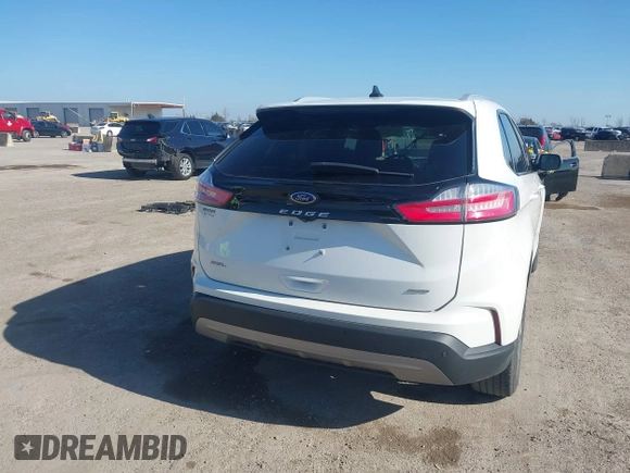 2022 Ford Edge SEL z VIN 2FMPK4J90NBA02961, wystawiony jako IAAI lot #41446422 z przebiegiem 29 313 mil mil oraz . Historia ofert i sprzedaży dostępna na DreamBid. Obrazek 17.