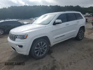 2018 Jeep Grand Cherokee High Altitude with VIN 1C4RJECG2JC442627, listed as a Copart auction lot 61041495 with 88,115 mi miles and Salvage title. Bid and sale history available at DreamBid. Image 1.