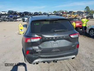 2020 Ford Escape Titanium with VIN 1FMCU9J9XLUA66440, listed as a IAAI auction lot 41464049 with 57,626 mi miles and . Bid and sale history available at DreamBid. Image 16.