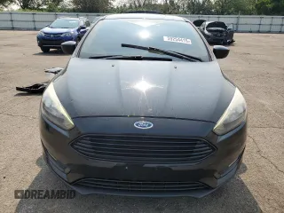 2018 Ford Focus SE z VIN 1FADP3F2XJL228407, wystawiony jako Copart lot #59254415 z przebiegiem 75 241 mil mil oraz Szkoda całkowita • Salvage title. Historia ofert i sprzedaży dostępna na DreamBid. Obrazek 5.