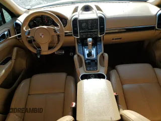 2012 Porsche Cayenne with VIN WP1AA2A2XCLA10081, listed as a Copart auction lot 55394935 with 181,316 mi miles and Salvage title. Bid and sale history available at DreamBid. Image 8.