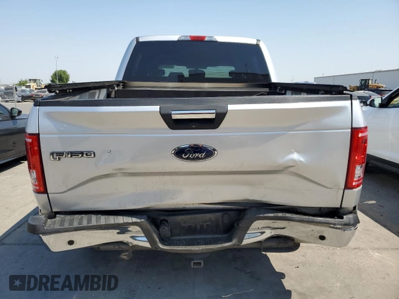 2015 Ford F-150 XL with VIN 1FTEW1CP4FFA57780, listed as a Copart auction lot 64268785 with 160,714 mi miles and Salvage title. Bid and sale history available at DreamBid. Image 6.