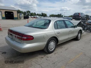 1997 Lincoln Continental with VIN 1LNLM97V7VY731116, listed as a Copart auction lot 67058894 with 0 mi miles and Salvage Title. Bid and sale history available at carsss.com. Image 3.