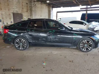 2014 BMW 3 Series Gran Turismo 328i xDrive with VIN WBA3X5C55ED242955, listed as a IAAI auction lot 41743111 with 71,095 mi miles. Bid and sale history available at carsss.com. Image 13.