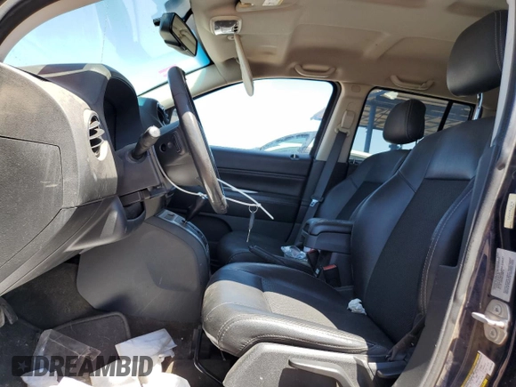 2016 Jeep Compass Latitude z VIN 1C4NJCEAXGD735156, wystawiony jako Copart lot #56607755 z przebiegiem 163 996 mil mil oraz Szkoda całkowita • Salvage title. Historia ofert i sprzedaży dostępna na DreamBid. Obrazek 7.