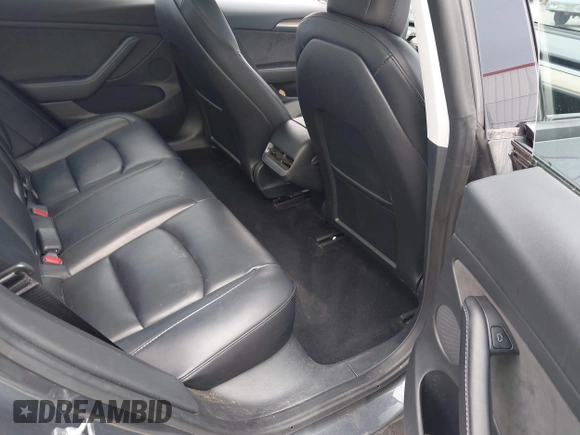 2023 Tesla Model 3 z VIN 5YJ3E1EA1PF449575, wystawiony jako IAAI lot #42457119 z przebiegiem 51 084 mil mil oraz . Historia ofert i sprzedaży dostępna na DreamBid. Obrazek 8.