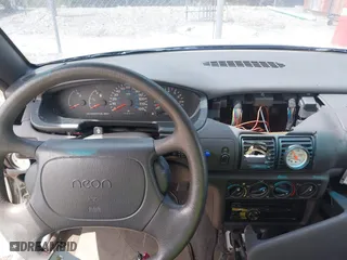 1998 Dodge Neon Competition with VIN 1B3ES47C4WD574210, listed as a IAAI auction lot 41957542 with 98,477 mi miles. Bid and sale history available at carsss.com. Image 12.