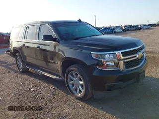 2016 Chevrolet Suburban LS z VIN 1GNSCGKC3GR316344, wystawiony jako IAAI lot #41990429 z przebiegiem 100 010 mil mil oraz . Historia ofert i sprzedaży dostępna na DreamBid. Obrazek 1.