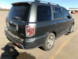 2006 Honda Pilot EX-L with VIN 2HKYF18586H514424, listed as a IAAI auction lot 41663778 with 210,020 mi miles. Bid and sale history available at carsss.com. Image 4.
