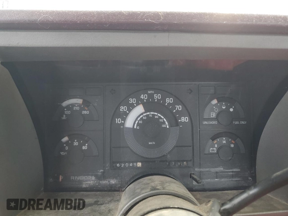 1990 GMC Sierra 1500 z VIN 1GTFC24K8LE514419, wystawiony jako Copart lot #57265335 z przebiegiem 162 045 mil mil oraz Szkoda całkowita • Salvage title. Historia ofert i sprzedaży dostępna na DreamBid. Obrazek 9.
