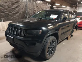2021 Jeep Grand Cherokee Laredo X with VIN 1C4RJFAG3MC647726, listed as a IAAI auction lot 38421907 with 56,514 mi miles and . Bid and sale history available at DreamBid. Image 2.