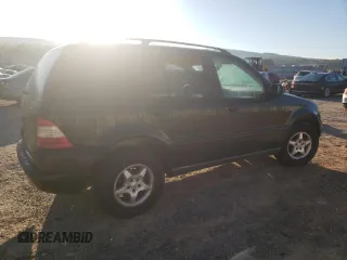 1999 Mercedes-Benz M-Class with VIN 4JGAB54E0XA118194, listed as a Copart auction lot 75242784 with 284,187 mi miles and Salvage Title. Bid and sale history available at carsss.com. Image 3.