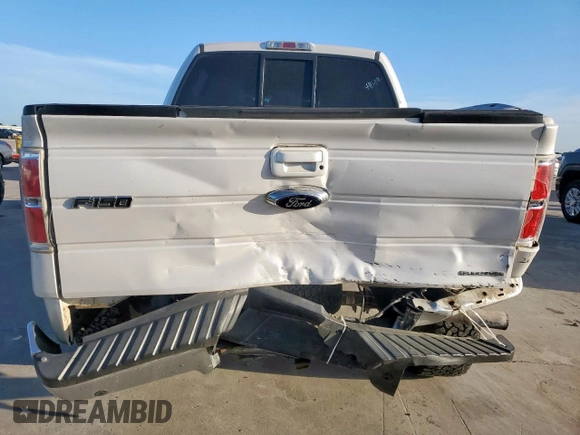 2014 Ford F-150 XL with VIN 1FTFW1EF0EKF18679, listed as a Copart auction lot 60872435 with 128,203 mi miles and Salvage title. Bid and sale history available at DreamBid. Image 6.