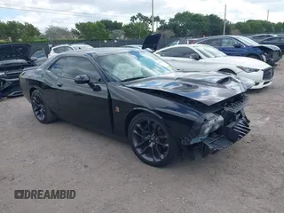 2022 Dodge Challenger R/T Scat Pack z VIN 2C3CDZFJ7NH151317, wystawiony jako IAAI lot #41561424 z przebiegiem 29 611 mil mil oraz . Historia ofert i sprzedaży dostępna na DreamBid. Obrazek 1.