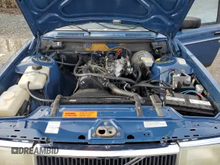 1990 Volvo 240 z VIN YV1AA8845L1400684, wystawiony jako Copart lot #49742045 z przebiegiem 182 643 mil mil oraz Tytuł czysty. Historia ofert i sprzedaży dostępna na DreamBid. Obrazek 11.