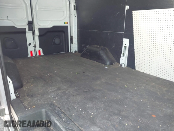 2020 Ford Transit Cargo with VIN 1FTBR1Y80LKA67205, listed as a IAAI auction lot 41805459 with 184,186 mi miles and . Bid and sale history available at DreamBid. Image 8.