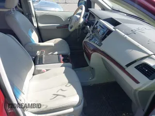 2014 Toyota Sienna XLE with VIN 5TDYK3DC8ES457940, listed as a IAAI auction lot 42039472 with 99,769 mi miles and . Bid and sale history available at DreamBid. Image 5.