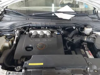 2005 Nissan Murano SL z VIN JN8AZ08T75W329392, wystawiony jako IAAI lot #41630639 z przebiegiem 199 811 mil mil oraz . Historia ofert i sprzedaży dostępna na DreamBid. Obrazek 10.