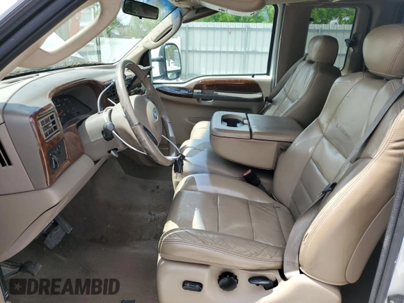2004 Ford F-250 XL z VIN 1FTNX20P24EA26599, wystawiony jako Copart lot #56707985 z przebiegiem 165 292 mil mil oraz Szkoda całkowita • Salvage title. Historia ofert i sprzedaży dostępna na DreamBid. Obrazek 7.
