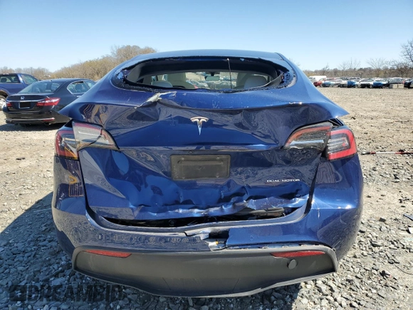 2022 Tesla Model Y Long Range z VIN 7SAYGDEE2NF358366, wystawiony jako Copart lot #50771255 z przebiegiem 73 554 mil mil oraz Szkoda całkowita • Salvage title. Historia ofert i sprzedaży dostępna na DreamBid. Obrazek 6.