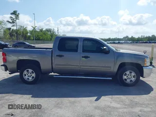 2013 Chevrolet Silverado 1500 LT with VIN 3GCPCSE01DG206827, listed as a IAAI auction lot 41976945 with 213,940 mi miles and . Bid and sale history available at DreamBid. Image 14.