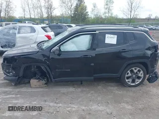 2018 Jeep Compass Limited with VIN 3C4NJDCB7JT332674, listed as a IAAI auction lot 42145567 with 111,852 mi miles and . Bid and sale history available at carsss.com. Image 14.