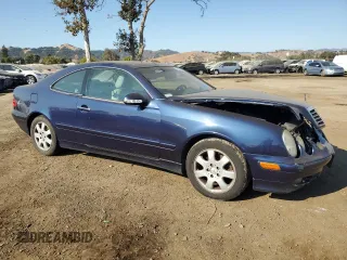 2000 Mercedes-Benz CLK 320/430 with VIN WDBLJ65G4YF161087, listed as a Copart auction lot 73549254 with 236,864 mi miles and Salvage Title. Bid and sale history available at DreamBid. Image 4.