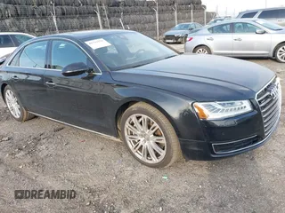 2015 Audi A8 3.0T with VIN WAU3GAFDXFN028244, listed as a IAAI auction lot 41791578 with 149,770 mi miles and . Bid and sale history available at DreamBid. Image 1.
