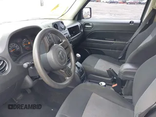2015 Jeep Patriot Sport with VIN 1C4NJRBB1FD121420, listed as a IAAI auction lot 42344487 with 124,288 mi miles and . Bid and sale history available at DreamBid. Image 12.