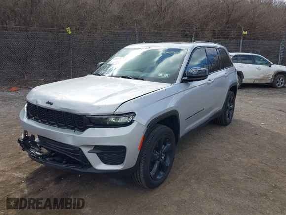 2023 Jeep Grand Cherokee Laredo with VIN 1C4RJHAG2PC660418, listed as a IAAI auction lot 41693879 with 4,295 mi miles and . Bid and sale history available at DreamBid. Image 20.