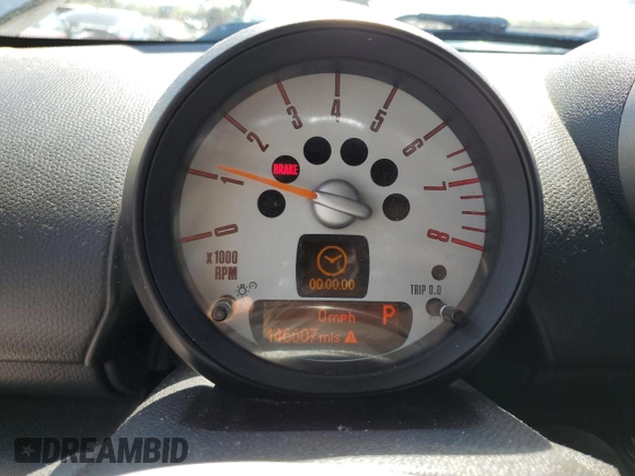 2011 MINI Countryman with VIN WMWZB3C56BWM00040, listed as a Copart auction lot 48660435 with 146,607 mi miles and Salvage title. Bid and sale history available at DreamBid. Image 9.