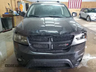 2013 Dodge Journey Crew with VIN 3C4PDCCG4DT693869, listed as a Copart auction lot 63666684 with 134,424 mi miles and Salvage title. Bid and sale history available at DreamBid. Image 5.