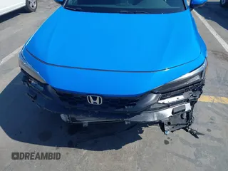 2024 Honda Civic Sport Touring z VIN 19XFL1G85RE026665, wystawiony jako IAAI lot #41735645 z przebiegiem 5025 mil mil oraz . Historia ofert i sprzedaży dostępna na DreamBid. Obrazek 6.