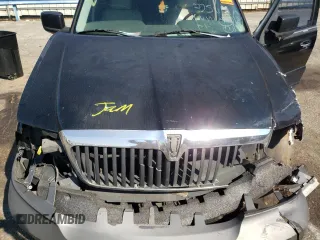 2004 Lincoln Navigator Luxury with VIN 5LMFU27R04LJ12874, listed as a Copart auction lot 76061434 with 243,480 mi miles and Salvage Title. Bid and sale history available at carsss.com. Image 13.