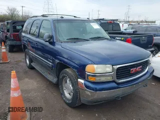 2003 GMC Yukon SLT with VIN 1GKEK13Z53J164945, listed as a IAAI auction lot 41903490 with 270,160 mi miles. Bid and sale history available at carsss.com. Image 1.