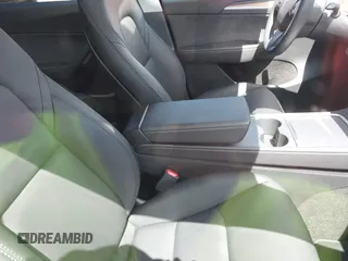 2024 Tesla Model Y Long Range with VIN 7SAYGAEE4RF078906, listed as a IAAI auction lot 42051207 with Not Provided miles and . Bid and sale history available at DreamBid. Image 5.