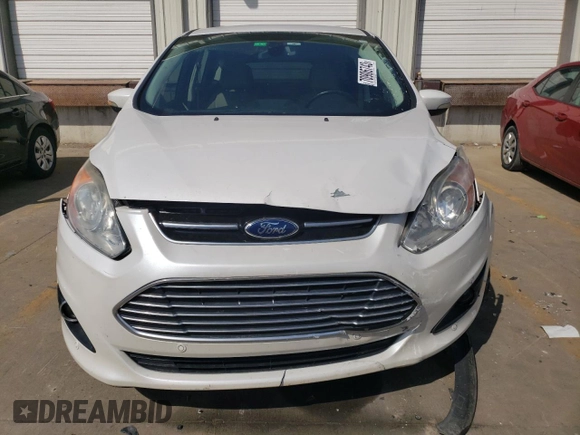 2015 Ford C-Max Energi SEL with VIN 1FADP5CU0FL107880, listed as a Copart auction lot 70906743 with 92,426 mi miles. Bid and sale history available at carsss.com. Image 5.